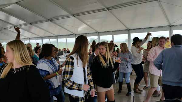 Sorority sisters and moms dancing at the winery